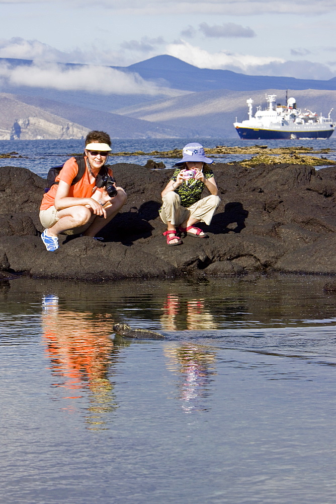 Lindblad Expeditions Guests doing fun and exciting things in the Galapagos Island Archipeligo, Ecuador. Model release number SMB0509.