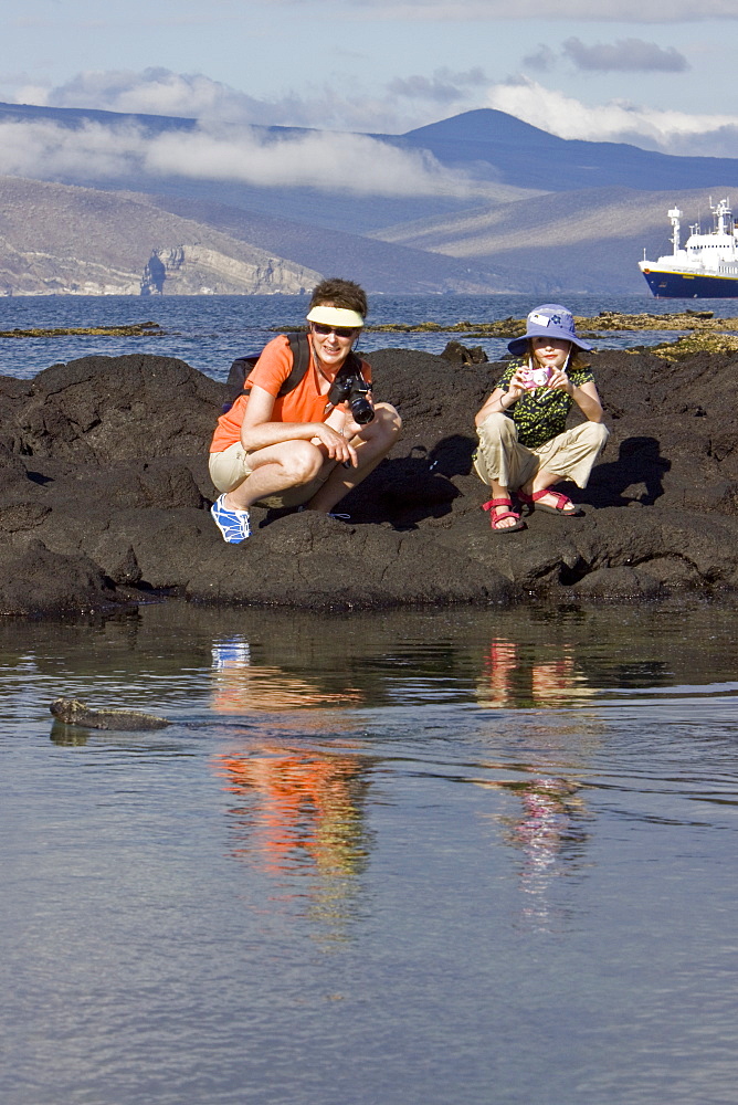 Lindblad Expeditions Guests doing fun and exciting things in the Galapagos Island Archipeligo, Ecuador. Model release number SMB0509.