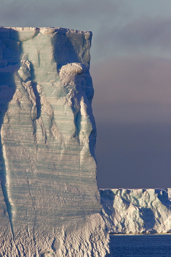 Huge tabular icebergs and smaller ice floes in the Weddell Sea, on the eastern side of the Antarctic Peninsula