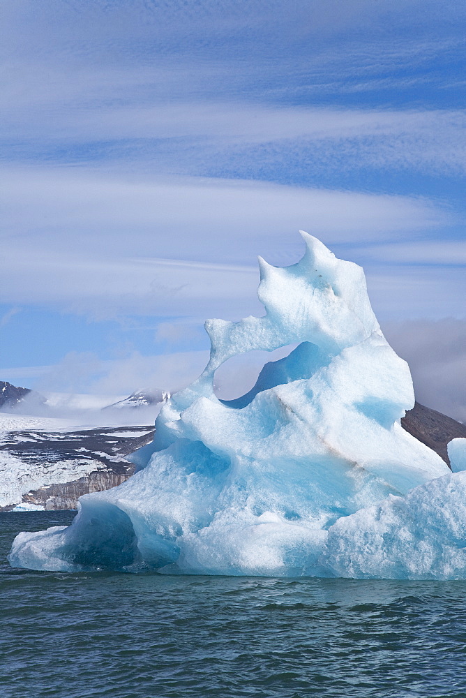 Calved icebergs from the glaciers at BlomstrandhalvÃ®ya in Kongsfjord on the western side of Spitsbergen in the Svalbard Archipelago, Norway.