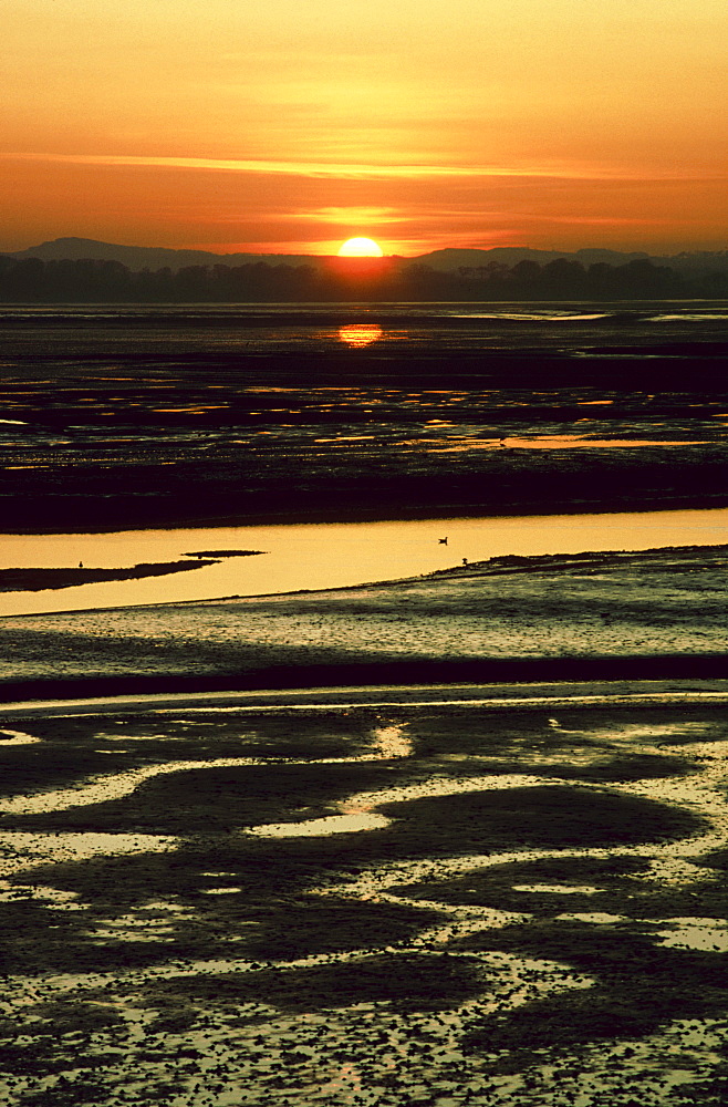 sunset on mudflats, montrose basin, angus, scotland