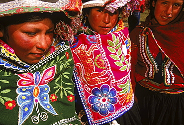 Boys and girls in traditional costumes perform dances in honor of a group of scientists visiting their remote Andean village.