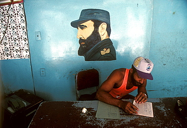 Likeness of Fidel castro on the wall of a government shop, Old Havana, Cuba