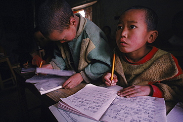 Boys at Buddhist monastery school study to become monks, learn dances, in the remote Kingdom of Mustang, Nepal.