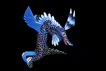 A fantastical animal carved in a village near Oaxaca, Mexico. Oaxaca is famous for fantastical animals carved from wood and colorfully painted.