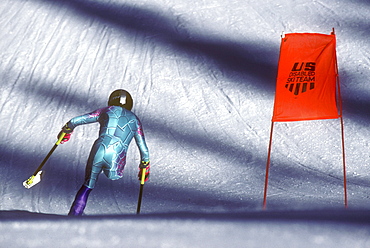 A disabled (amputee) skier, also known as a three-track skier, speeds down a practice race course during a training session for the U.S. Disabled Ski Team at Purgatory Ski Resort near Durango, Colorado