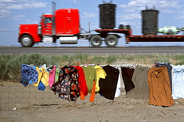 A sign for recently renamed U.S. Highway 666 stands alongside the road south of Cortez, Colo. Citizen and Native American groups petitioned the federal government to change the number of the road for fear the devilish connection contributed to accident and fatality rates on the highway.