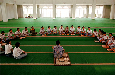 Karanganyar City Mosque, where young men come after school to pray and study the Koran.