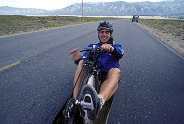 Engineers, athletes and enthusiasts gather on a lonely road in the San Luis Valley in central Colorado to try to break the speed record for a human powered vehicle. These vehicles are basically very, very aerodynamic bicycles.