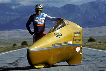 Engineers, athletes and enthusiasts gather on a lonely road in the San Luis Valley in central Colorado to try to break the speed record for a human powered vehicle. These vehicles are basically very, very aerodynamic bicycles.