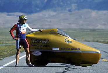 Engineers, athletes and enthusiasts gather on a lonely road in the San Luis Valley in central Colorado to try to break the speed record for a human powered vehicle. These vehicles are basically very, very aerodynamic bicycles.