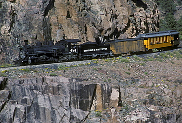 Coal-fired, steam-powered locomotive of the Durango & Silverton Narrow Gauge Railroad on the tracks between Silverton and Durango, Colorado