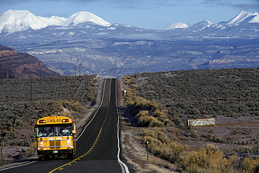 School bus in early morning in the Paradox Valley, an unusual valley at the center of the Paradox Basin, Colorado. The Paradox Basin was home to numerous uranium mines.