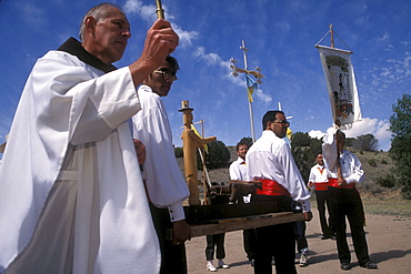 A reenactment of a religious procession at El Rancho de Las Golondrinas, a recreated Hispanic theme village for visitors near Santa Fe, New Mexico