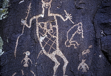 Prehistoric Indian petroglyphs on a volcanic ridge in the Galesteo Basin near Santa Fe, New Mexico