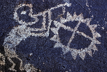 Prehistoric Indian petroglyphs on a volcanic ridge in the Galesteo Basin near Santa Fe, New Mexico