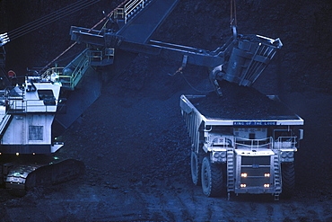 Black Thunder coal mine on Thunder Basin National Grassland, WY. Mike Hockett and Cary Klein are operationg the Ursa Major drag line. This is the largest operating piece of earth moving equipment in North America and removes about 150 feet of overburden to get to a 70 foot seam of coal. Royalties from the coal on the grassland generation about $30 million a year.