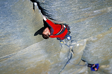 Tommy Caldwell rock climbs a crack on the headwall of The Salathe Wall 5.13 on El Capitan in Yosemite National Park, California. Caldwell is a professional rock climber and has free climbed more on El Capitan than any other climber.