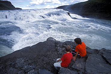 An Icelandic boy and an American boy visit the famous Gullfoss waterfall in southwestern Iceland.