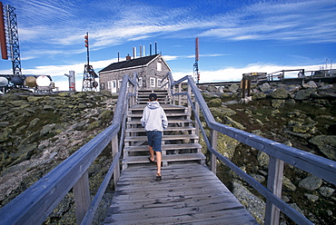 A young visitor on top of Mount Washington, the highest point in New Hampshire.