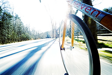 Bike riding down a Vermont road.