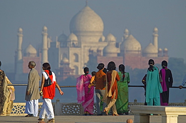 The Taj Mahal rises out of the plains of Uttar Pradesh as viewed from Agra's Red Fort. The Taj Mahal, one of the Seven Wonders of the World, was built by Moghul Emperor Shah Jahan between 1621-1623 and required the labor of thousands of artisans.