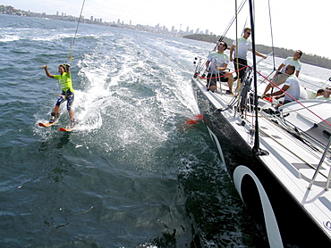 Water skier, Lauryn Eagle pulled behind the yacht. She was Miss Teen Australia for 2004 and the world speed champion  in speed water skiing for 2005.