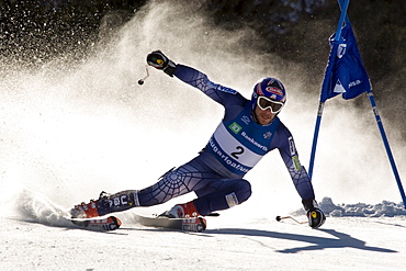 Bode Miller comes tight around a gate on his way to victory in the giant slalom of the 2006 US Alpine Championships at Sugarloaf in Maine. Bode also won the down hill championship.