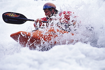 James Mole kayaks on the standing wave at Skookumchuck Narrows. Egmont, British Columbia, Canada