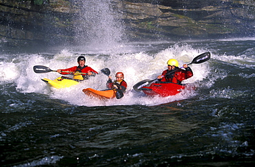 Eric Jackson, one of the happiest dads around, surfing his favorite hole with his kids Emily and Dane on the Caney Fork River in Rock Island, Tennessee.