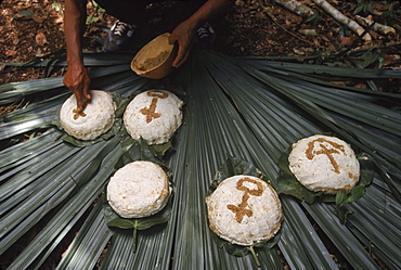 Cha-Cha'ac Ceremony. "Chac" is the Myan word for rain. This is a rain ceremony held in the middle of the growing season of corn to bring or to assure good rainfall for the crop. They decorate the bread with paste made up of ground squash seeds and wrap it in leaves to bake. The ceremony is held in a clearing near the village. An alter is built and a H'man (religious figure) is brought in to conduct the ceremony and say prayers. It is a combination of Catholic and Mayan gods and prayers.