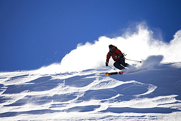 Man powder skiing, France