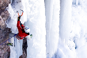 Woman ice climbing, Colorado