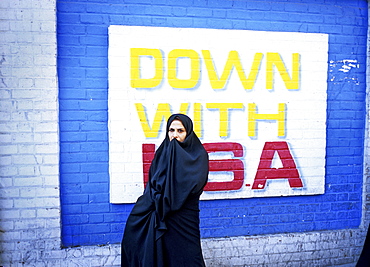 Anti-American murals painted on the wall of the former American Embassy in Tehran, Iran.