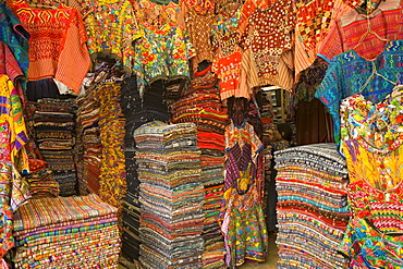 Authentic and colorful textiles in shopping both, Antigua, Guatemala