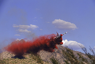 Fire fighters fight fire in the Harquahala Mountains.