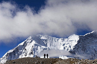 Two trekkers during the exploration of Kanshung Valley, East side of the Everest