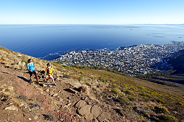 Katrin Schneider and Susann Scheller on a hike to the top of Lion's Head above the city of Cape Town. South Africa.