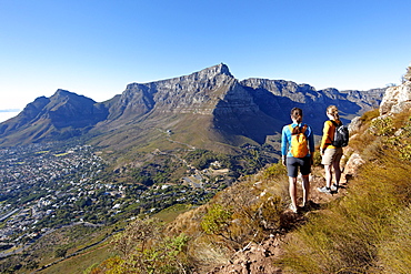 Katrin Schneider and Susann Scheller on a hike to the top of Lion's Head above the city of Cape Town. South Africa.