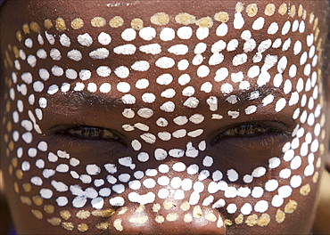 This is a very exotic and a small tribe living in the Weyto Valley Desert, the young boys decorate their faces with white and colored dots.  Arbore tribe, Weyto Valley Desert, South Ethiopia, 2010