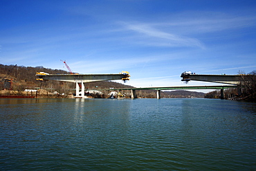 Water-level view of the new I64 bridge under construction over the Kanawha River in downtown Charleston, WV.