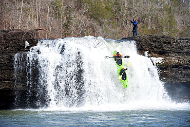 Two professional kayakers in a tandem kayak run falls in Tennessee.