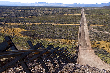 The new Normandy-style border fence runs through parts of eastern Arizona.