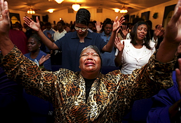 Church members worship at a Sunday morning service.