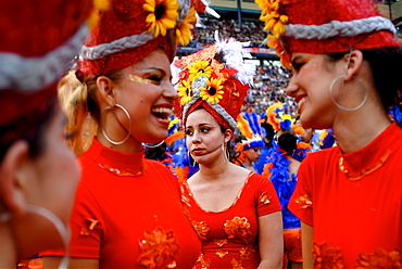 Costumed carnival dancers wait backstage in Merida, Venezuela.