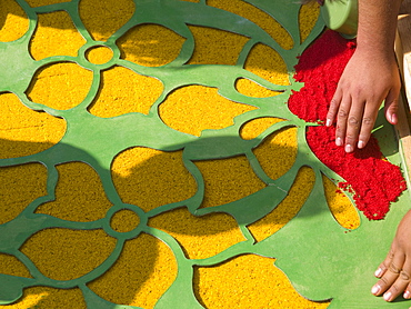 Residents of the city make alfombras, or carpets, in the city of Antiqua, Guatemala.