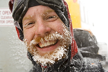 Weather observer with his beard caked with ice, after hiking to the summit for his shift change at the Mt. Washington Observator