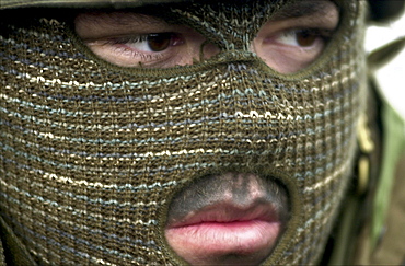 A US Navy man wears cold weather protection during an exercise in Northern California.