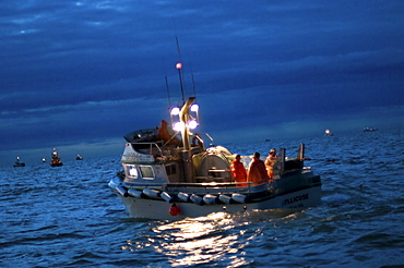 Gillnet fishing boat at twilight, Bristol Bay, Alaska