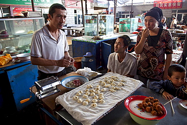 Food section of bazaar in Turpan, Xinjiang, China.